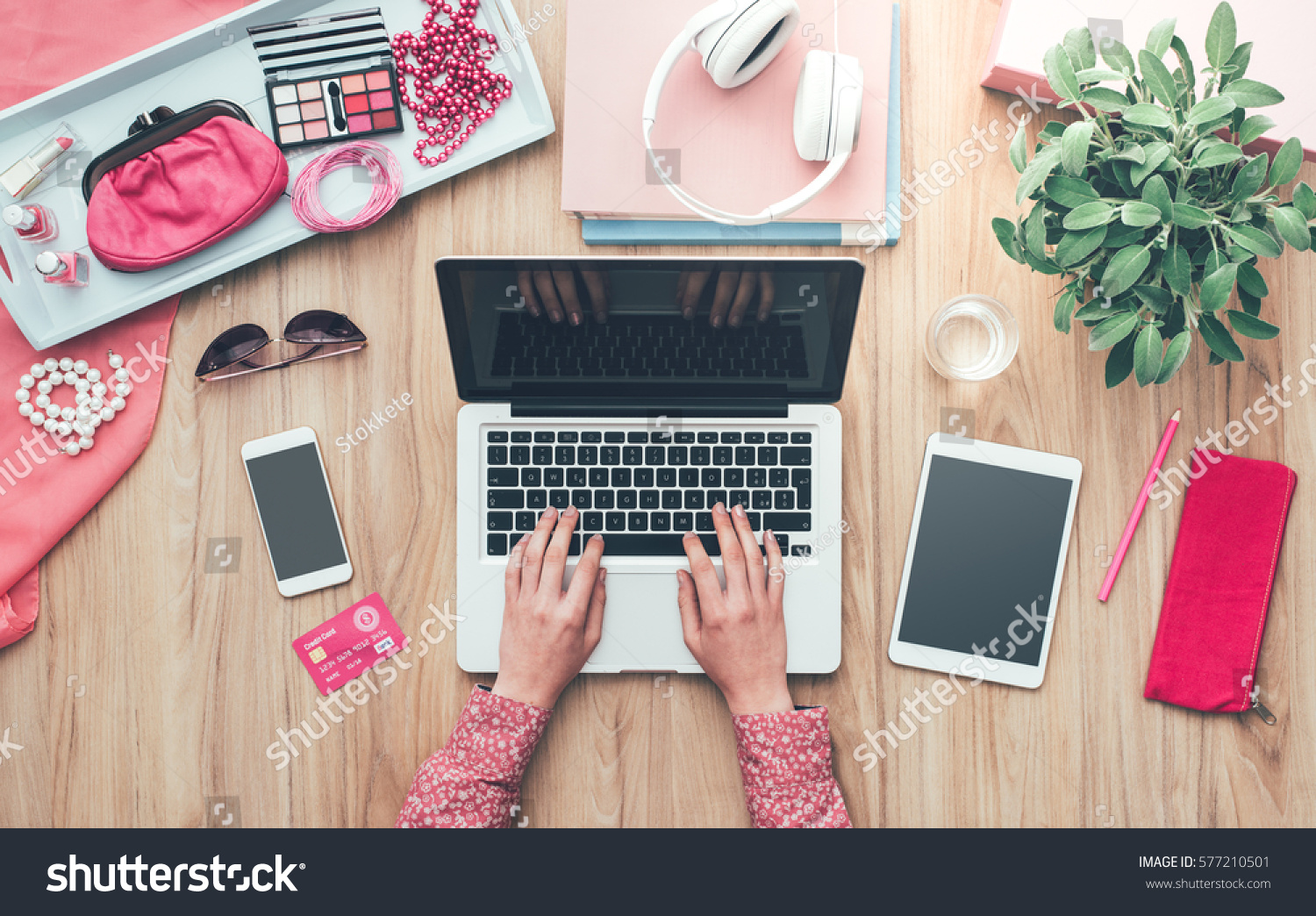 stock-photo-fashion-blogger-working-at-office-desk-with-a-laptop-fashion-beauty-and-technology-concept-577210501